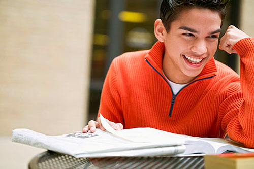 Smiling student studying