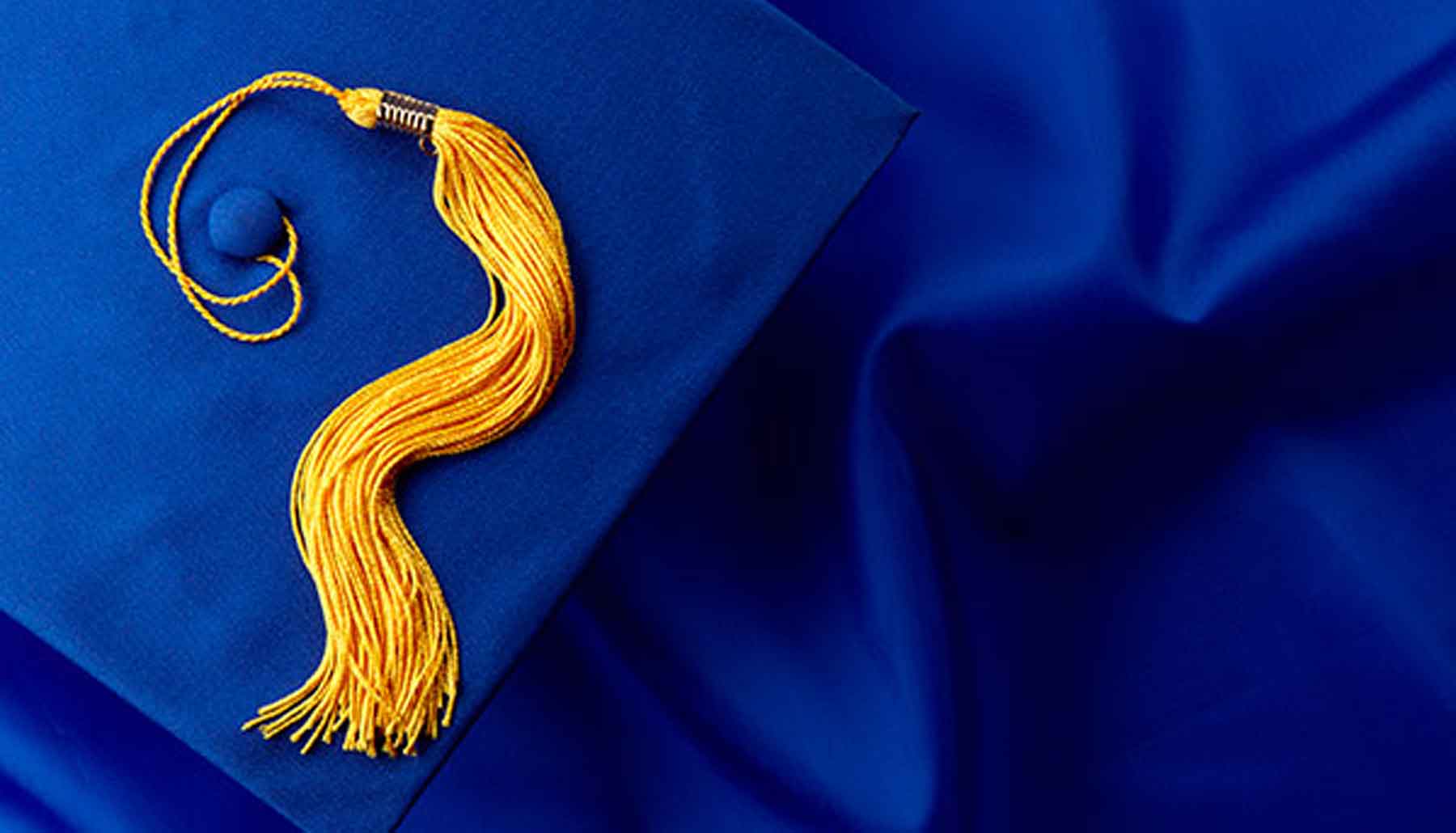 Blue graduation cap with a yellow tassel