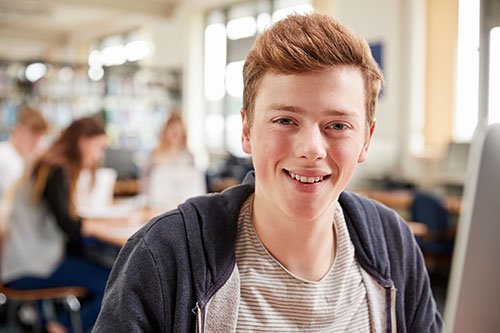 Smiling male college student