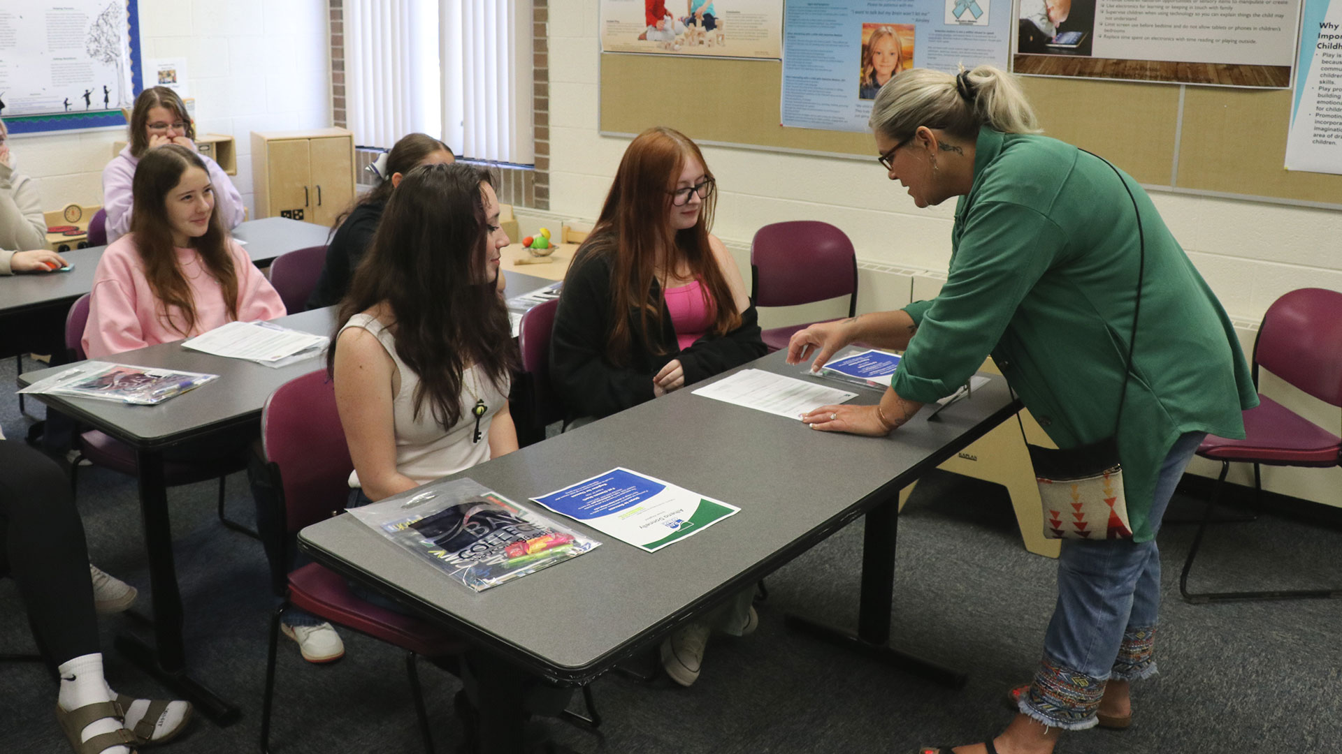 Coordinator and Lead Instructor for the Early Childhood Education Program at Bay College Tammra Houseman helps visiting high school seniors explore programs and degrees.