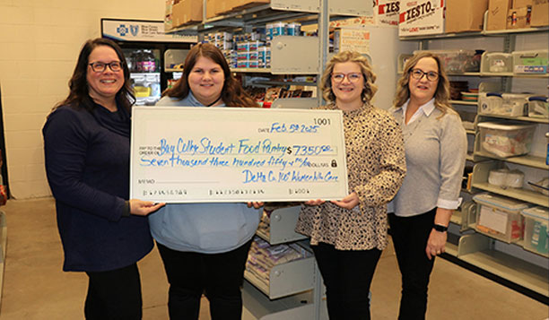 Amy Gibbs, Director of Career and Workforce Development; Sierrah Hallum, Bay College Student & Food Pantry Staff; Samantha Griebel, Steering Committee Member; Chris Tryan, Steering Committee Member.