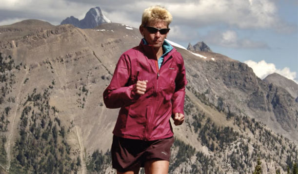 Pam Reed running on a trail in the Teton Range in Wyoming.