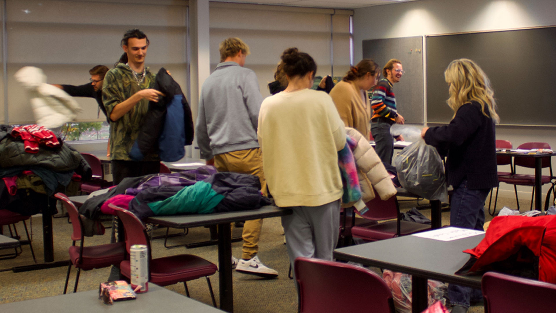 Bay/LSSU BPA club students sorting all 207 donations received.