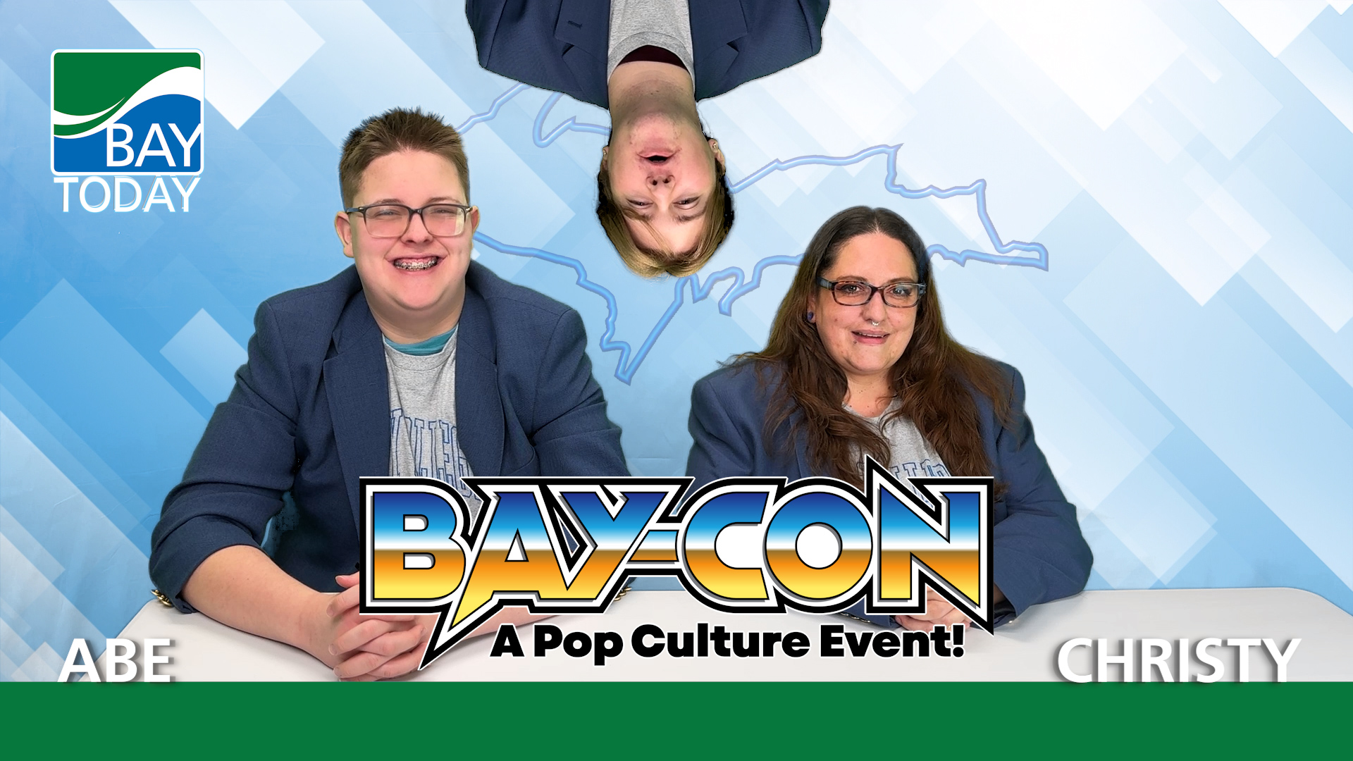 Bay Today Anchors Abe Wessel and Christy Koester announce that BAY-CON will soon return, while Anchor Tom Kluka comes down from the ceiling yodeling in celebration.