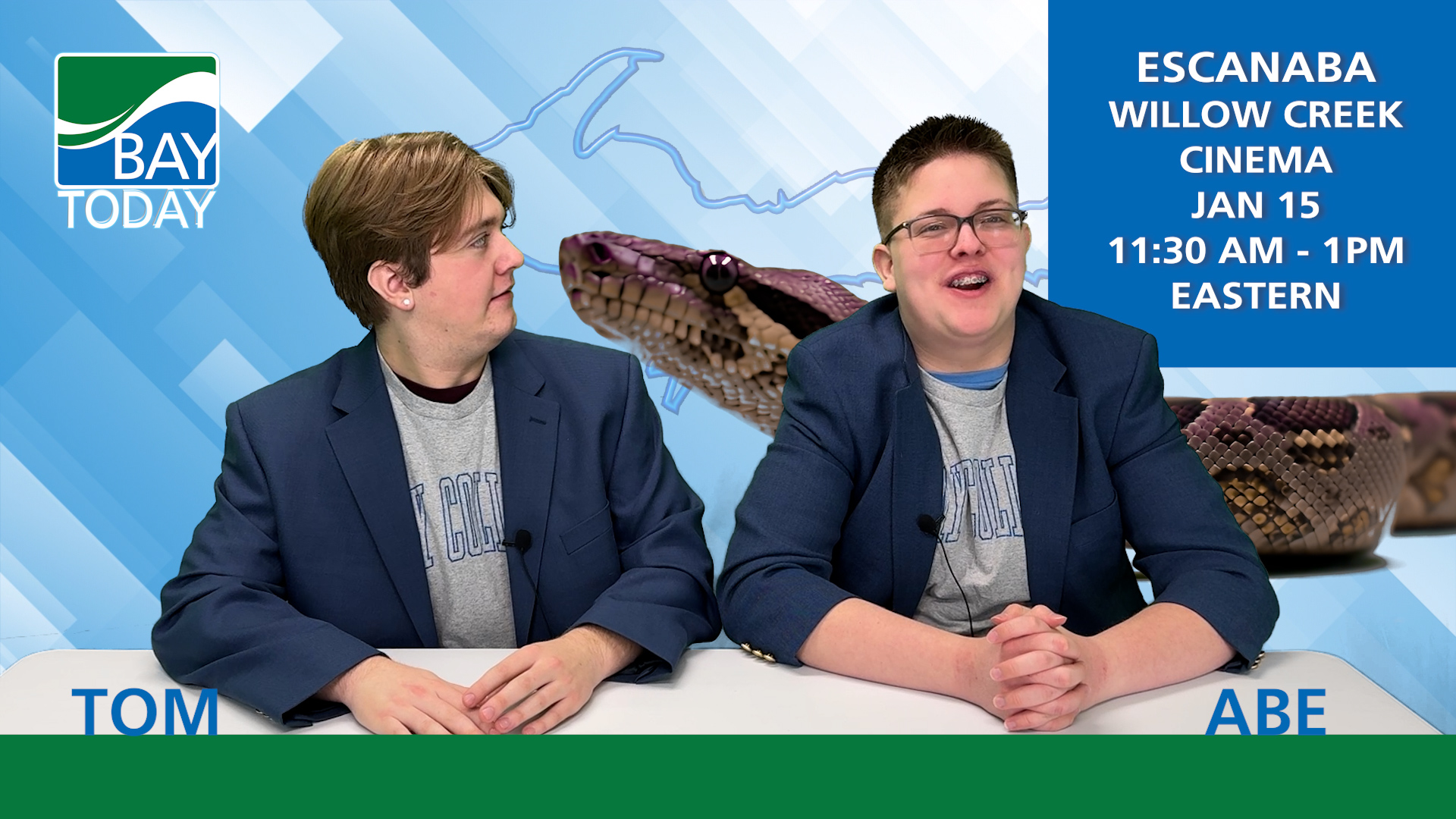 Bay Today Anchors Tom Kluka and Abe Wessel encounter a CGI giant snake while reading the news.
